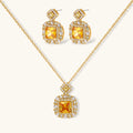 14K gold-plated jewelry set featuring square-cut cubic zirconia stones in ornate layered settings on white background.