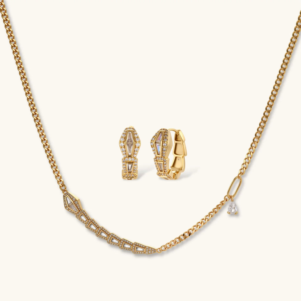 Gold-plated necklace with geometric diamond segments and matching huggie earrings featuring cubic zirconia details