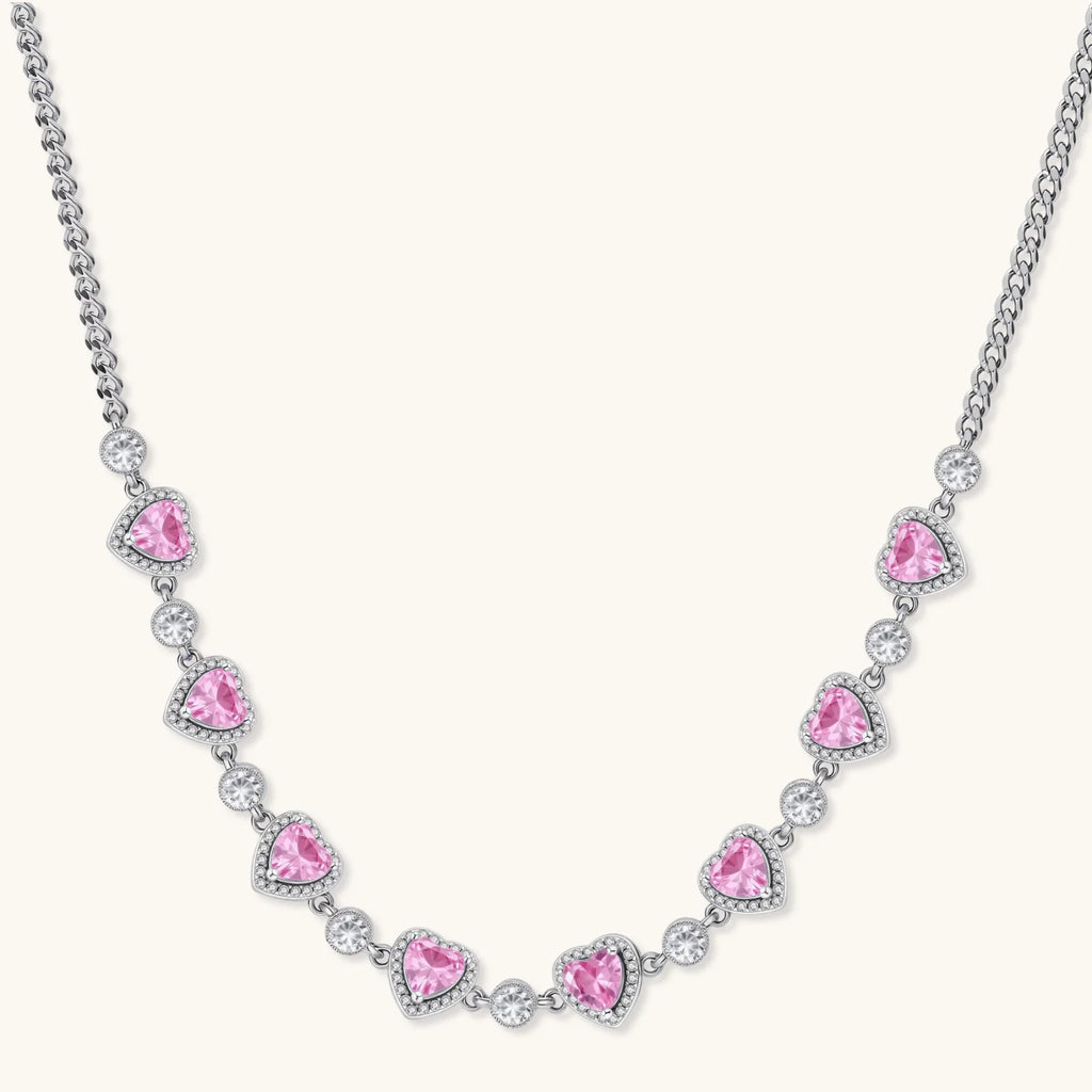 Pink heart-shaped cubic zirconia jewelry set with white gold plating featuring necklace, earrings, bracelet and ring